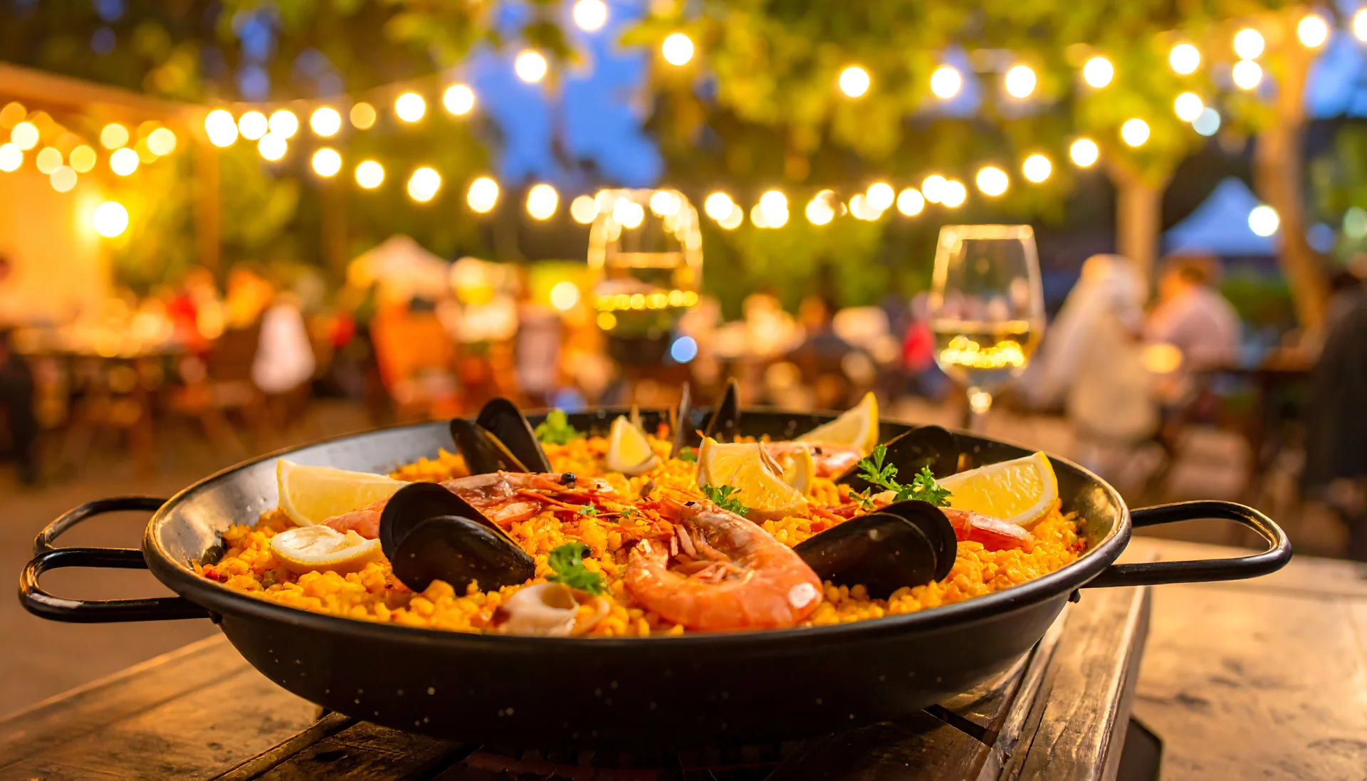 Paella dish with Spanish wine