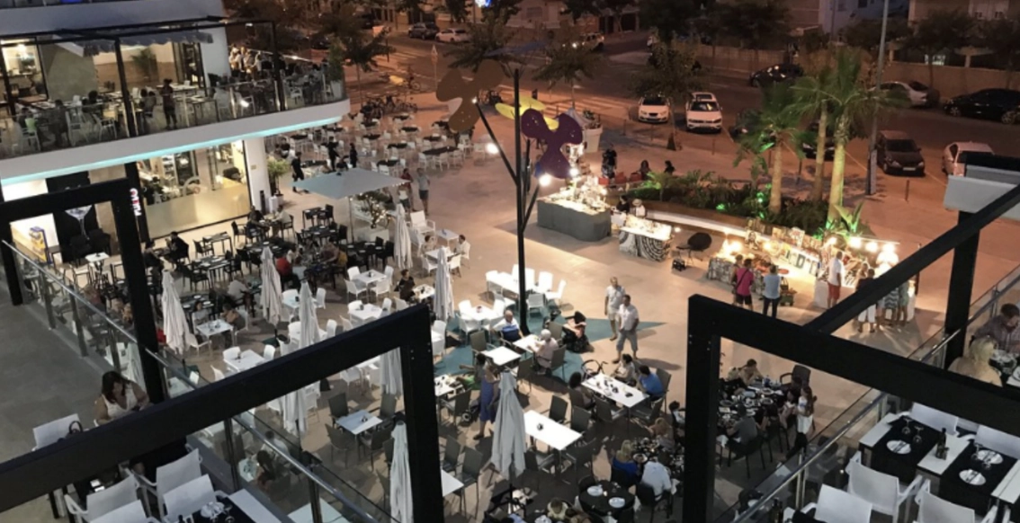 Outdoor dining area at night- Torre de La Horadada