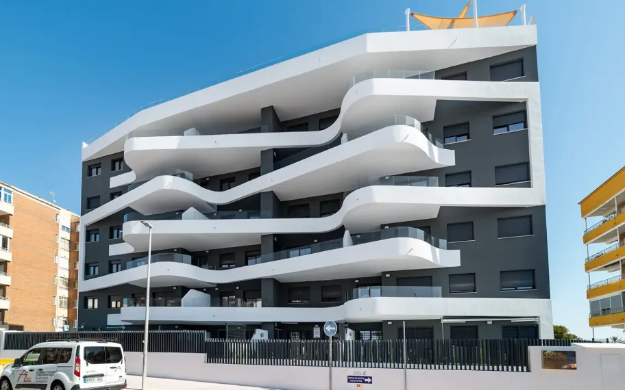 36 Modern apartments near the stunning beach in Punta Prima